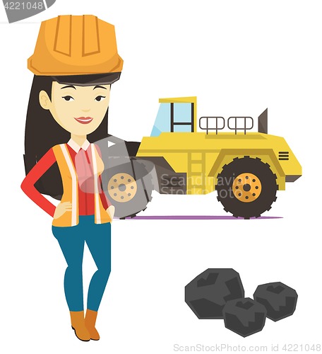 Image of Miner with a big excavator on background.