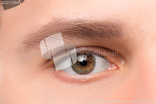 Image of Beautiful brown man eye close up