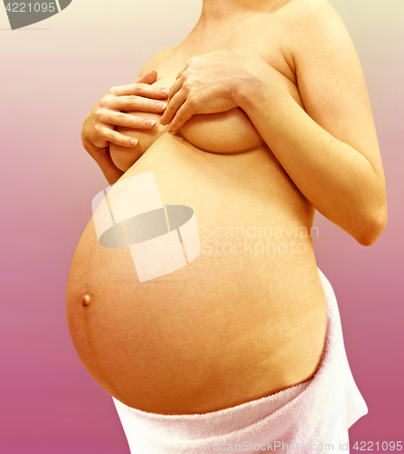Image of part of young pregnant lady