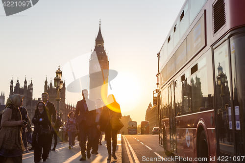 Image of Traffic and random people on Westminster Bridge in sunset, London, UK.