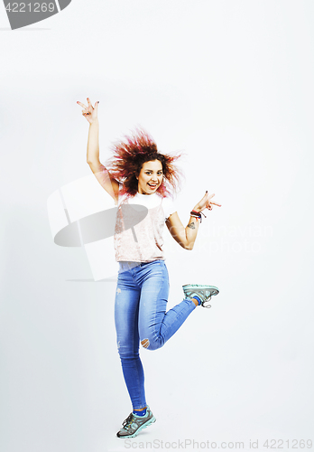 Image of young pretty jumping mulatto woman posing cheerful emotional isolated on white background, lifestyle people concept 