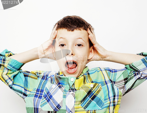 Image of young pretty little cute boy kid wondering, posing emotional face isolated on white background, gesture happy smiling close up, lifestyle people concept