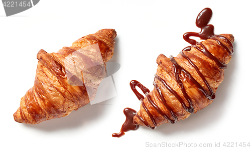 Image of two croissants on white background