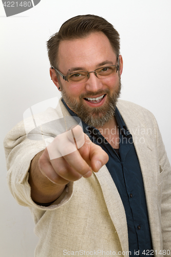 Image of Bearded man is calling and gestures with his finger