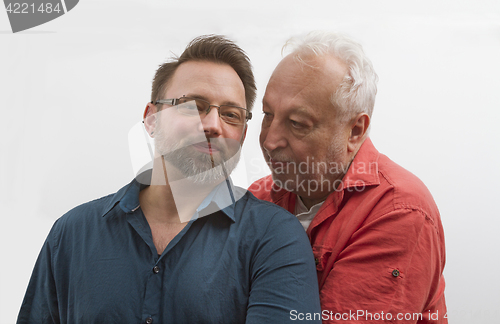 Image of Gay couple looking happy