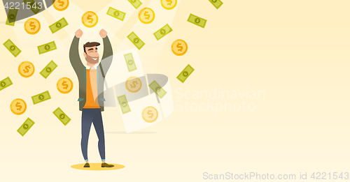 Image of Happy busiessman under money rain.