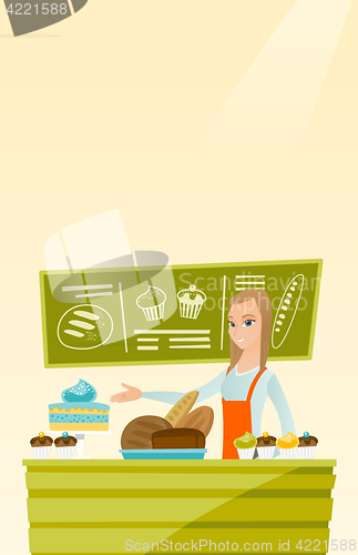 Image of Worker standing behind the counter at the bakery.