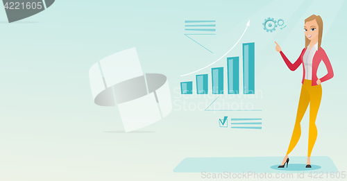 Image of Successful business woman pointing at chart.