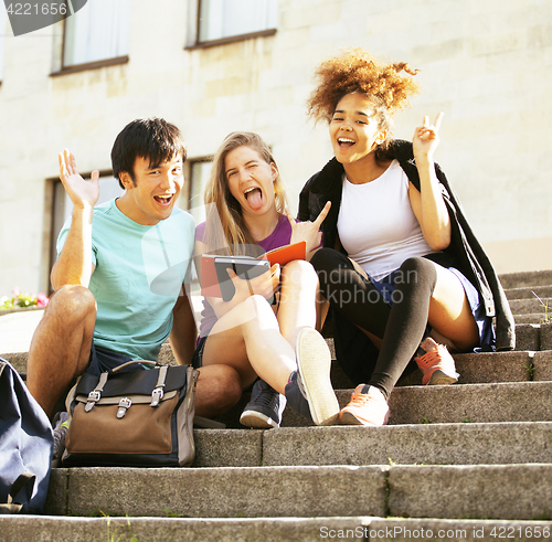 Image of portrait of international group of students close up smiling, bl