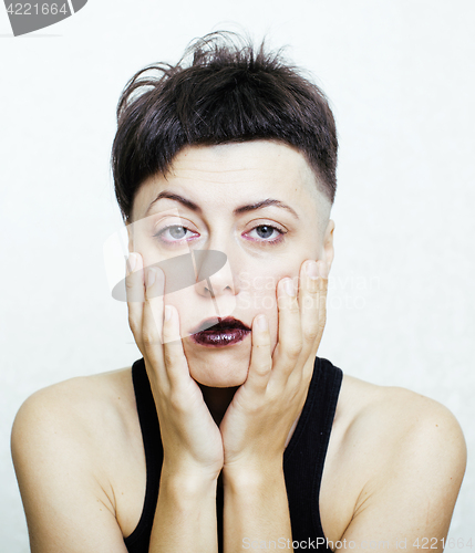 Image of portrait of young girl teenage looking bad like junkie isolated on white background, social issues concept 