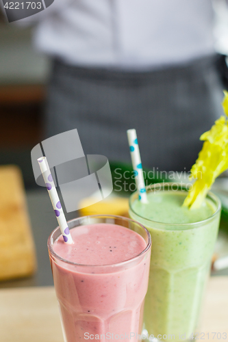 Image of Crop shot of chef and smoothies