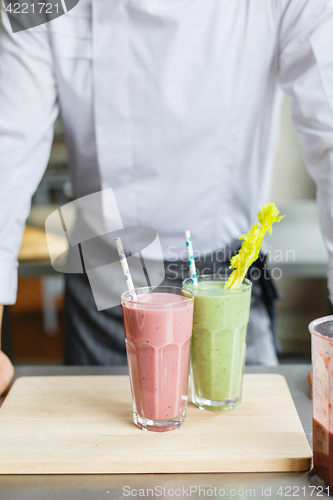 Image of Crop shot of chef and smoothies