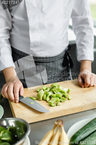 Image of Crop shot of chef making vegetable smoothie