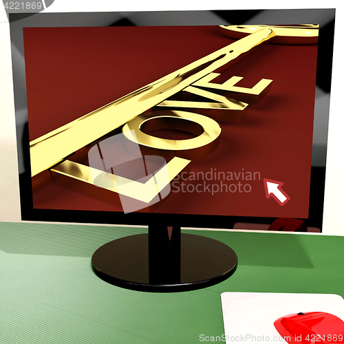 Image of Love Key On Computer Screen Showing Online Dating