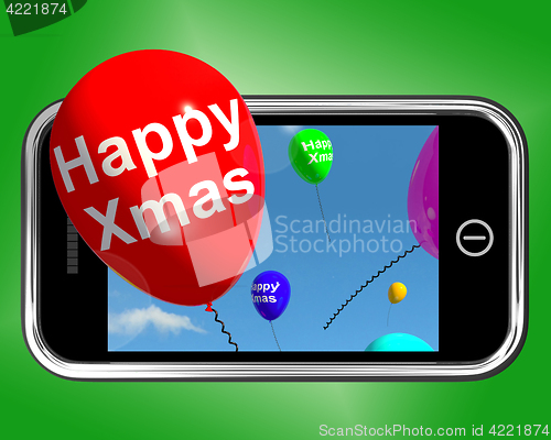 Image of Balloons Floating From Mobile Phone With Happy Xmas