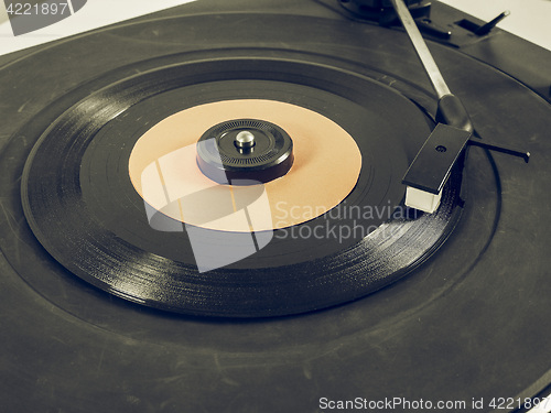 Image of Vintage looking Vinyl record on turntable