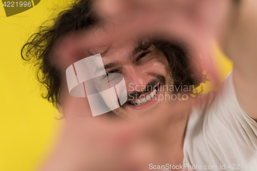 Image of young man with funny hair over color background