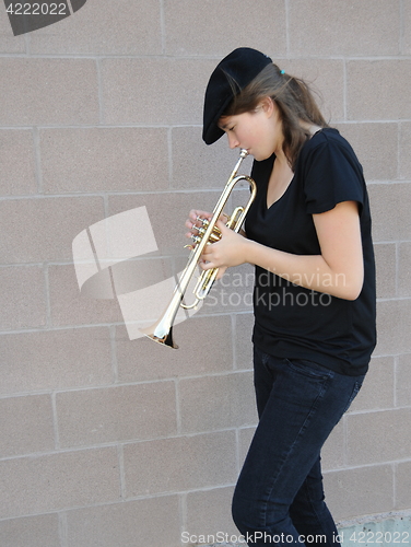 Image of Female trumpet player.