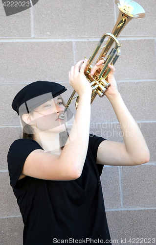 Image of Female trumpet player.