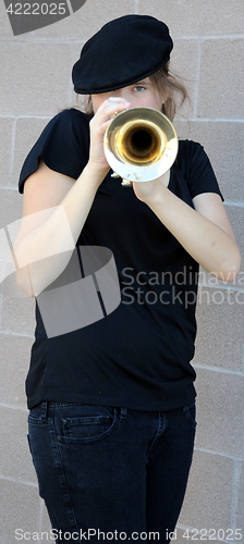 Image of Female trumpet player.