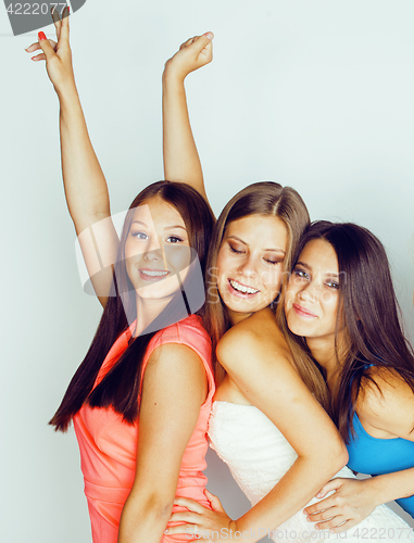 Image of group of many cool modern girls friends in bright clothers together having fun isolated on white background, happy smiling lifestyle people concept