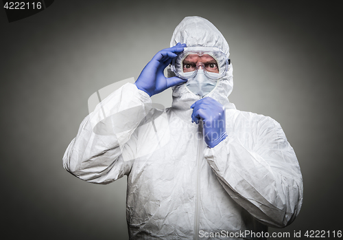 Image of Man With Intense Expression Wearing HAZMAT Protective Clothing A