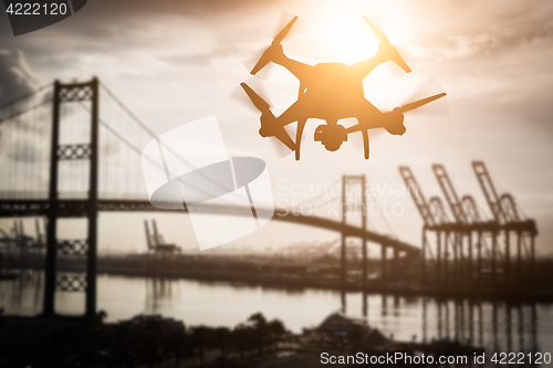 Image of Silhouette of Unmanned Aircraft System (UAV) Quadcopter Drone In