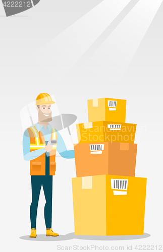 Image of Warehouse worker scanning barcode on box.