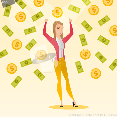 Image of Happy busiess woman under money rain.