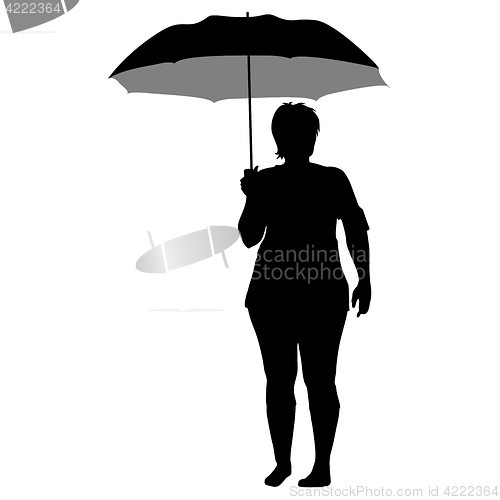 Image of Black silhouettes of women under the umbrella