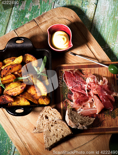 Image of Potato Wedges and Jamon