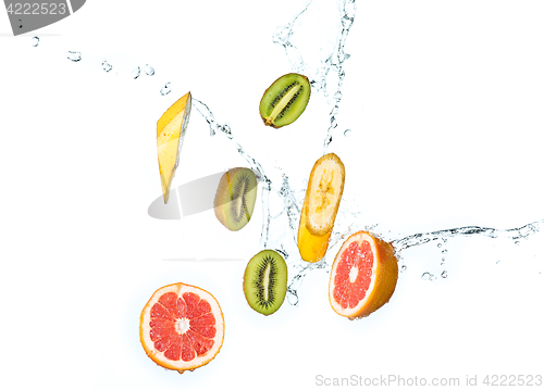Image of Fresh fruits falling in water splash, isolated on white background