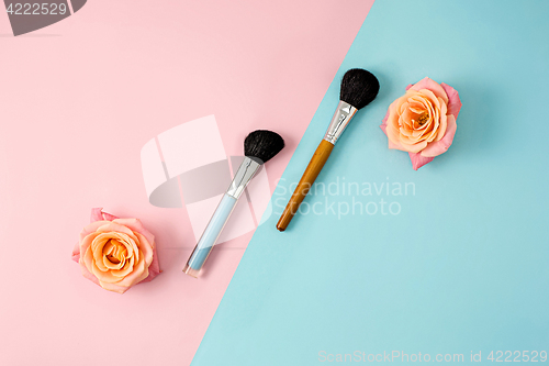 Image of Make up brushes on colorful background