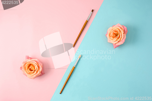 Image of Make up brushes on colorful background