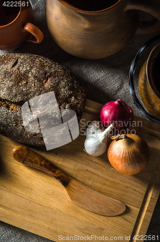 Image of Top view on homemade bread and onions