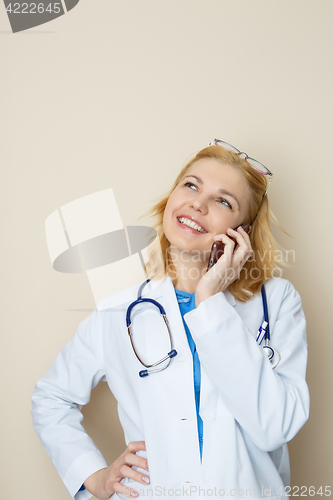 Image of Young girl talking on phone