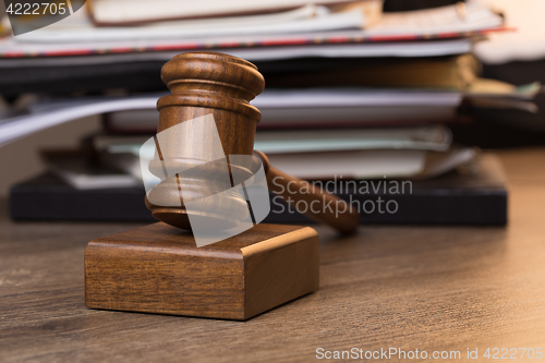 Image of Documents, hammer chairman on table