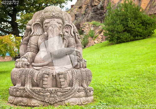 Image of Ganesha statue in a beautiful mountain garden