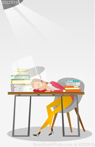 Image of Female student sleeping at the desk with book.