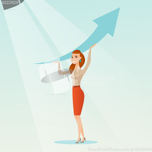 Image of Business woman holding arrow going up.