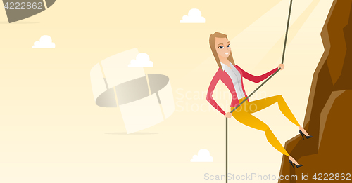 Image of Business woman climbing on the mountain.