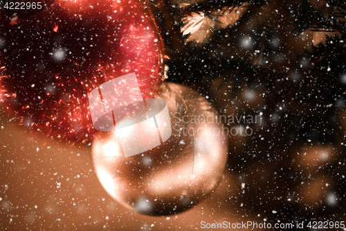 Image of Christmas decoration on tree with light