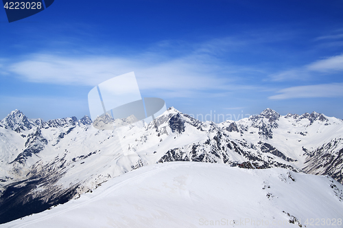 Image of Mountain peaks and off-piste slope for freeriding in sun winter 