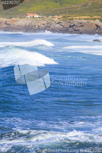 Image of Rocky Coast Extending into the Sea