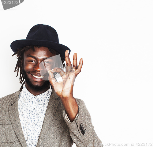 Image of young handsome afro american boy in stylish hipster hat gesturing emotional isolated on white background smiling, lifestyle people concept 