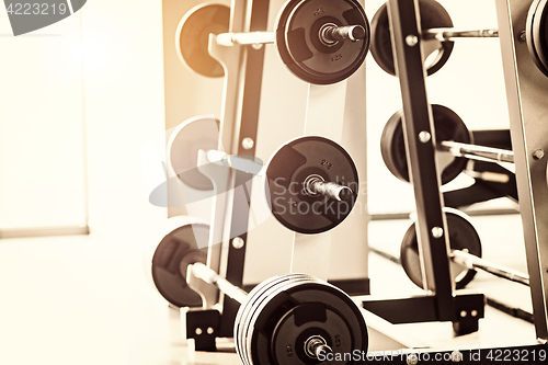 Image of Close up view of barbell on floor in gym