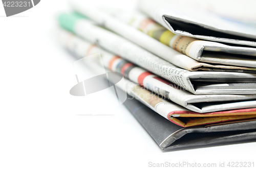 Image of Newspapers folded and stacked