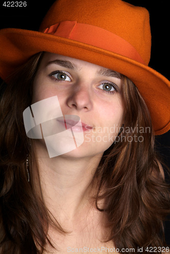 Image of woman with orange hat