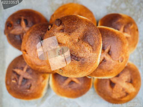 Image of Pumkin seed buns on baking paper sfter baking at close-up in a n