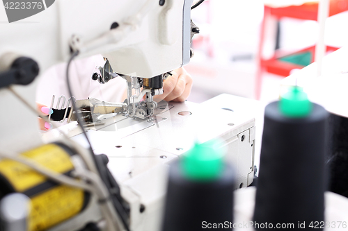 Image of Sewing. Factory, sewing room. Production of apparel.